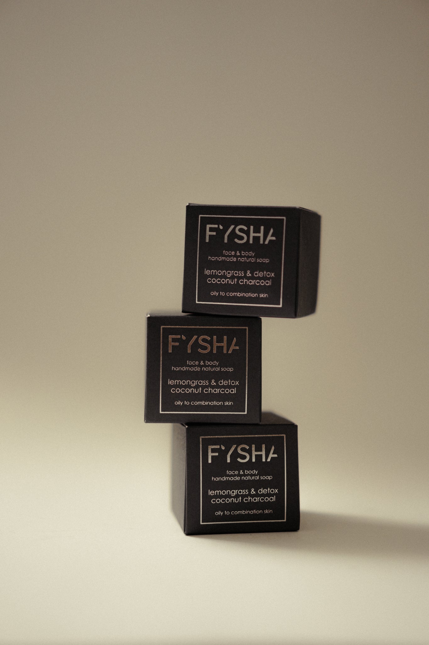 Natural plastic-free vegan soap bar with lemongrass essential oil and detox coconut charcoal