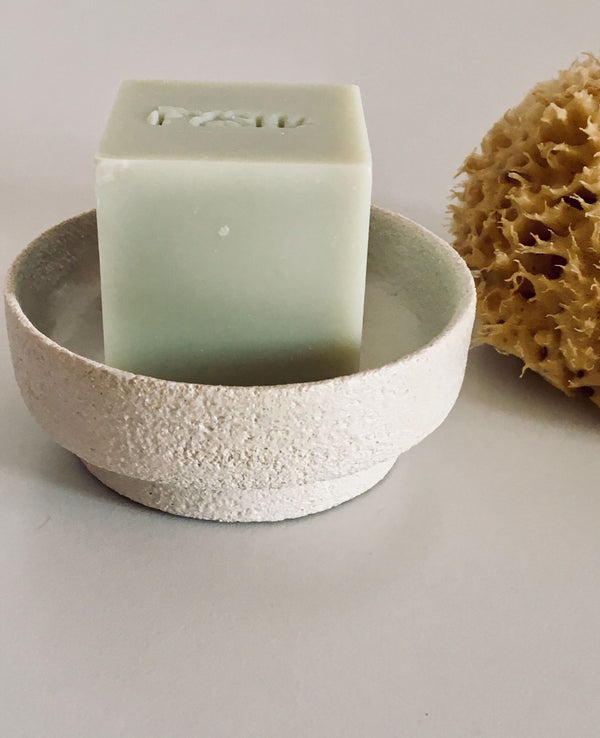 Fysha handmade vegan soap in a handmade ceramic soap dish with a sustainably harvested all-natural sea sponge